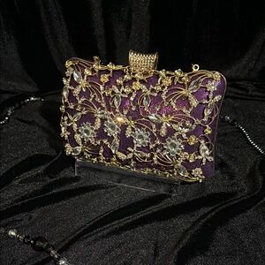 Elegant Purple Clutch with Gold Accents